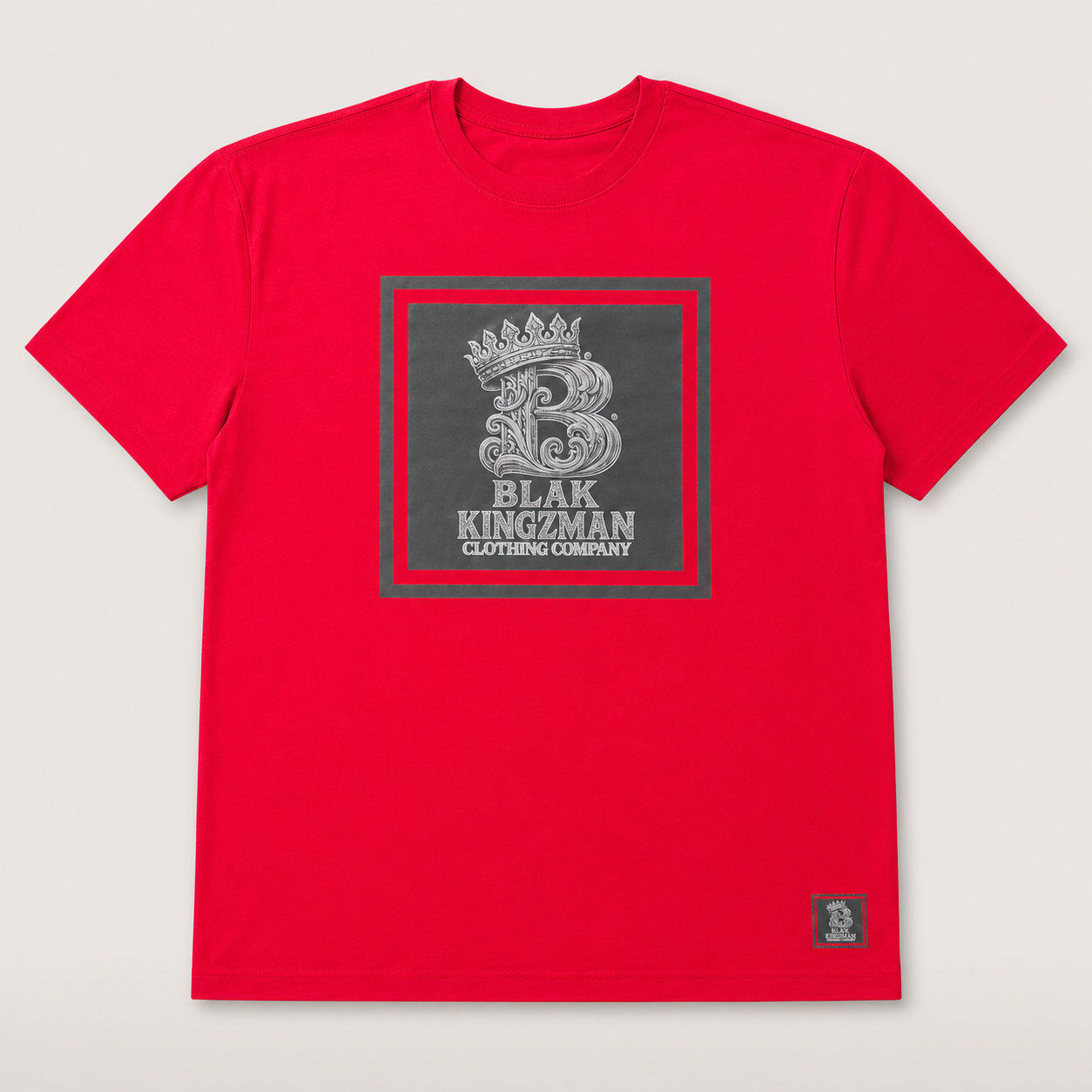 BLAK KINGZMAN Framed Crowned B Red Tee — square-framed crest graphic on red unisex tee