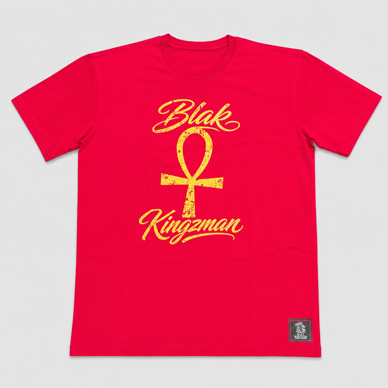 BLAK KINGZMAN Gold Ankh Red Tee — distressed gold ankh symbol and script print on red unisex tee